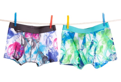 Underwear Hanging on a Clothesline isolated on white background