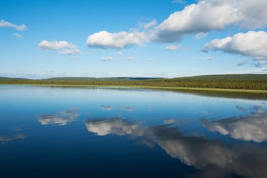 natural reflections on a lake and beautiful clouds