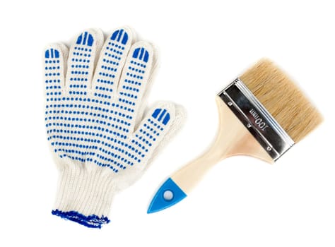 Cotton gloves with blue rubber inserts and a new 100 mm brush to paint. Isolate on white.