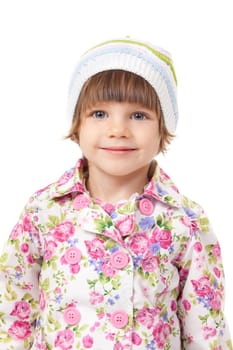 close-up vertical portrait of charming little girl in a cap
