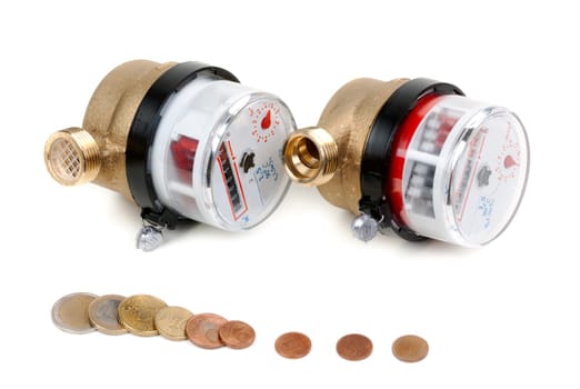 Water meters and coins with euro money. Isolate on white.