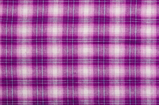 Purple cloth, checkered background.