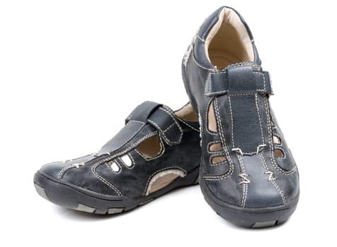 Pair of leather baby shoes. Isolate on white.