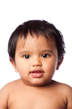 Cute happy baby face with black hair, on white.