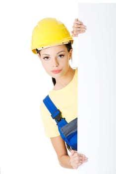 Female construction worker with blank board, isolated on white
