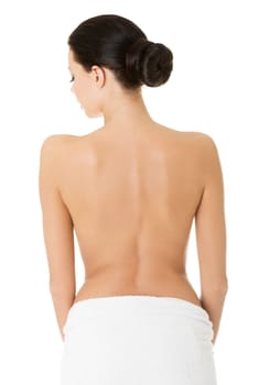 Young beautiful nude woman with towel , isolated on white