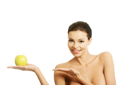 Happy fit woman with apple, isolated on white. Healthy lifestyle, det and nutrition concept.