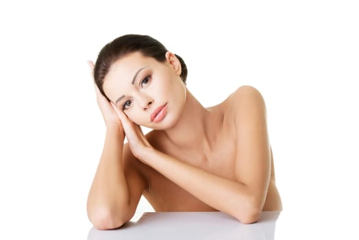 Portrait of a beautiful female model on white background