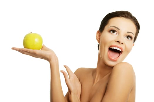 Happy fit woman with apple, isolated on white. Healthy lifestyle, siet and nutrition concept.