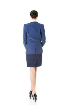 Rear view of young beautiful businesswoman, isolated on white