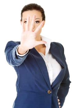 Serious business woman making stop sign over white