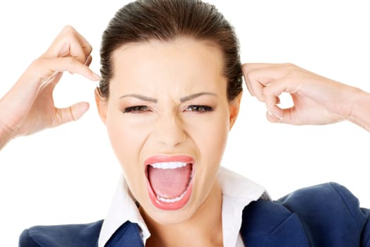 Stressed or angry businesswoman screaming loud , isolated on white