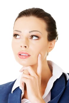 Young thoughtful businesswoman looking on side, isolated on white