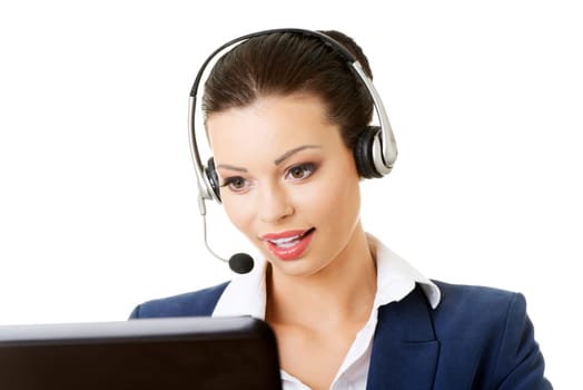 Beautiful young call-center assistant smiling , isolated on white