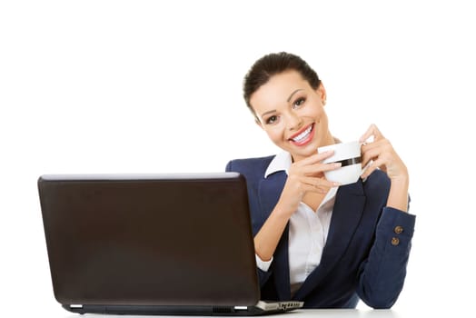 Beautiful success businesswoman at work. Isolated on white