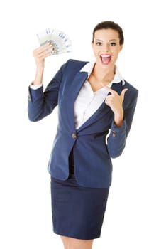 Happy attractive businesswoman holding euros , isolated