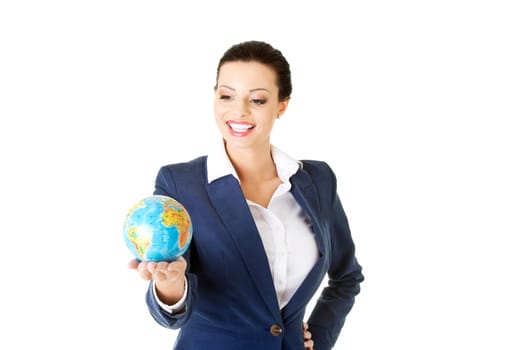 Young happy attractive brunette businesswoman holding the globe , isolated on white