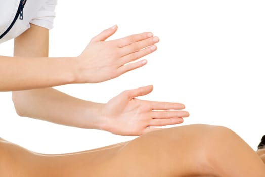 Preaty young woman relaxing beeing massaged in spa saloon