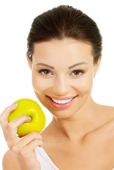 Beautiful woman with clean fresh healthy skin holding green apple. Isolated on white