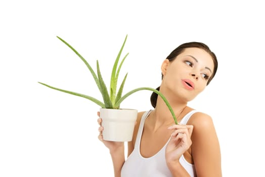 Young beautiful woman's face and aloe vera. Isolated on white background