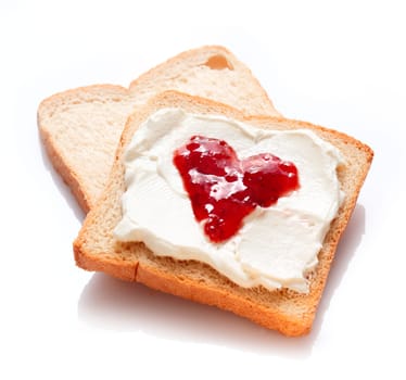 Two tasty slices of bread with jam and butter