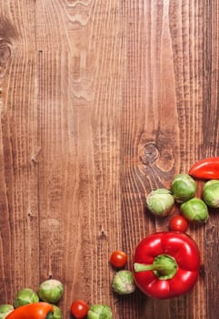 Composition of veggies on wooden table surface