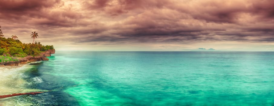 Panorama of a coastline at sunset time. Philippines