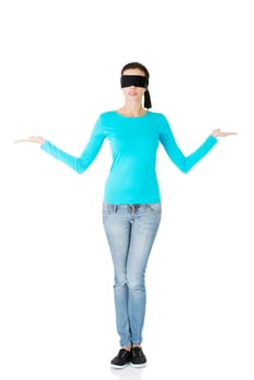 Blindfold woman presenting copy space on her palms, isolated on white