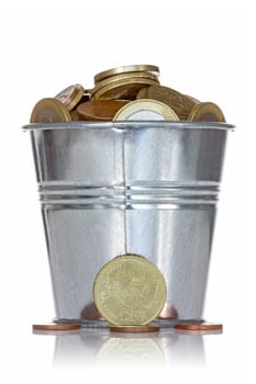 Full bucket of coins on white background