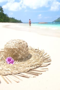 Straw hat lying on the beach