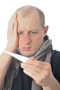 Man holding head in headache with thermometer in mouth. Isolated on white background
