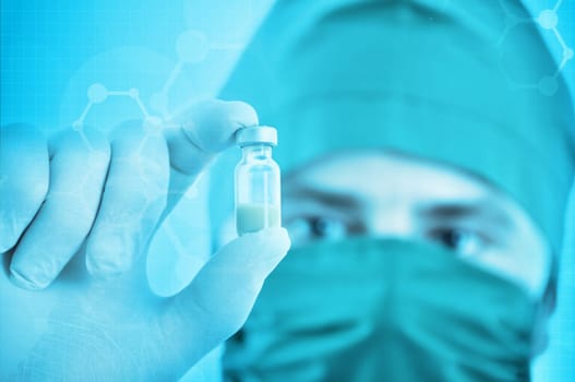 Doctor with drug in hand isolated on white background