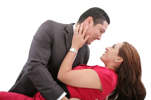 Portrait of a beautiful young happy smiling couple - isolated
