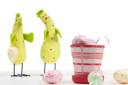 Easter chicken family with eggs on flowerpot isolated over white