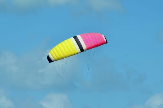 Kite umbrella under blue sky