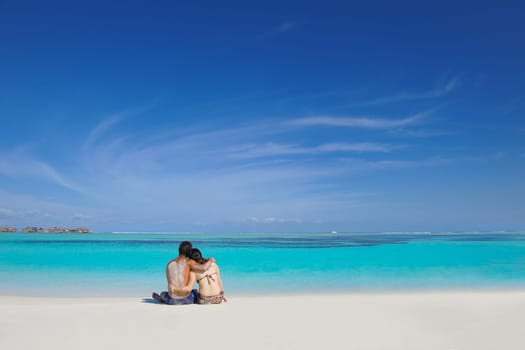 happy young asian couple have fun and romantic time at  summer on beautiful white sand beach