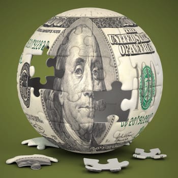 Photo of a jigsaw sphere image mapped with a 100 dollar bill on a green backdrop.