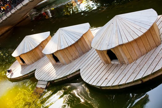 Wooden houseboats in the water