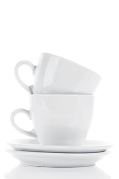 Stacked white cups on white background