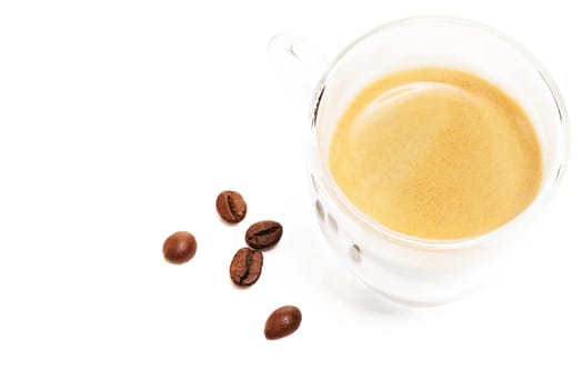 Espresso from oblique top with coffee beans on white background