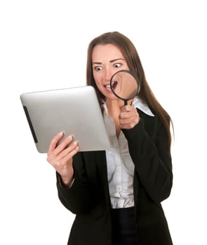 Businesswoman with tablet pc and magnifying glass