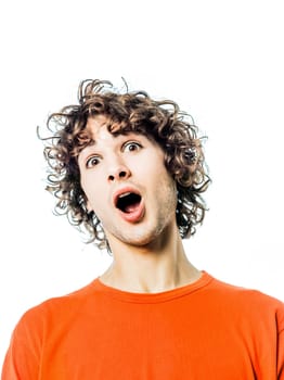 one young man caucasian surprised amazed portrait  in studio white background