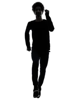 one african handsome young man running  in silhouette studio isolated on white background