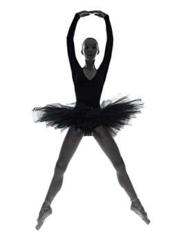 one caucasian young woman ballerina ballet dancer dancing with tutu in silhouette studio on white background