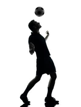 one man soccer player in studio silhouette isolated on white background