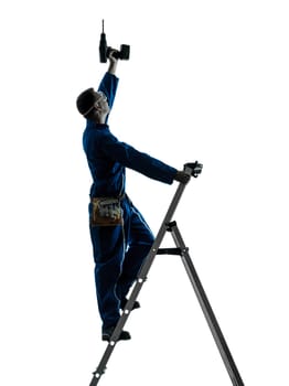 one caucasian man construction worker holding drill silhouette in studio on white background