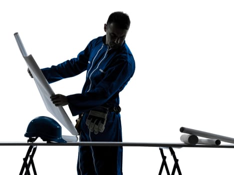 one caucasian man construction  Architect working plans silhouette in studio on white background