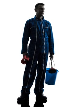 one caucasian janitor cleaner cleaning silhouette in studio on white background
