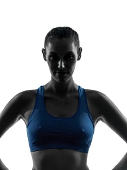 one caucasian woman exercising fitness portrait in silhouette studio isolated on white background