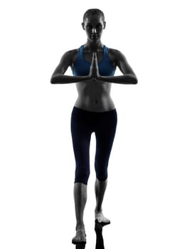 one caucasian woman exercising yoga warrior position in silhouette studio isolated on white background